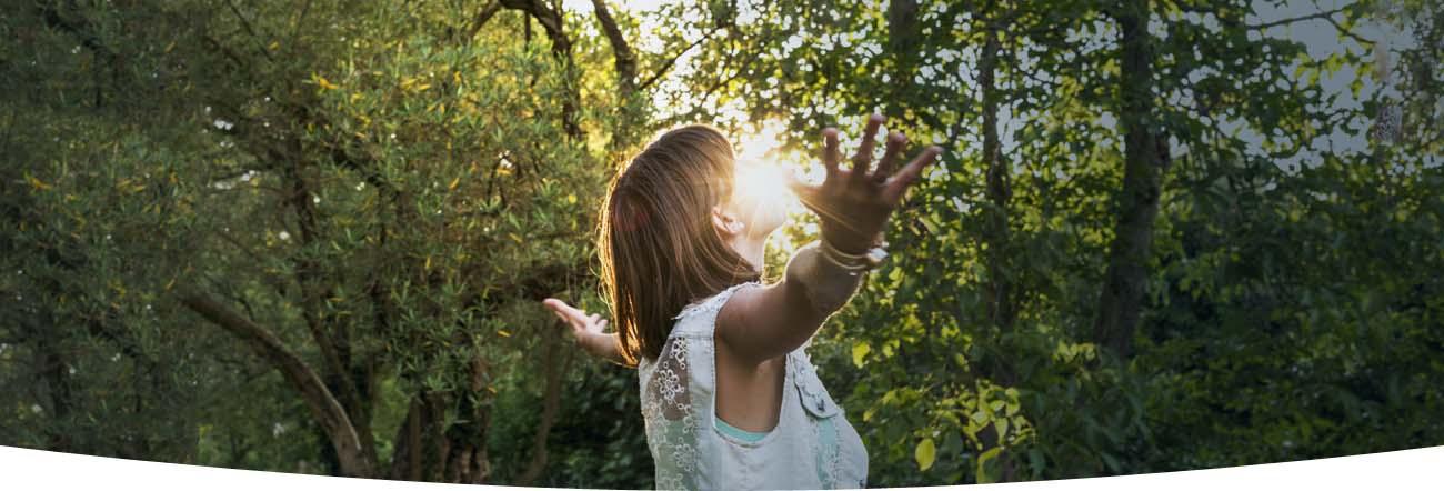 An image showing a woman liberated after going to a rehab clinic